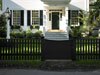 Benjamin Moore&rsquo;s midnight (2131-20) paint color gives this fence a new twist.