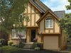 Garage doors painted in Benjamin Moore&rsquo;s everlasting (1038) enhance this home&rsquo;s overall style.