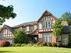The bold Benjamin Moore driftwood (2107-40) trim paint color lends an elegant look to this home.