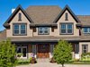 Trim painted in Benjamin Moore&rsquo;s wolf gray (2127-40) highlights this home&rsquo;s exterior characteristics.