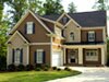 Shutters painted with Benjamin Moore&rsquo;s van deusen blue (HC-156) play a home&rsquo;s architectural details.
