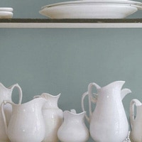 A kitchen painted a warm blue color