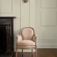 A living room painted blagdon yellow (DC-43)
