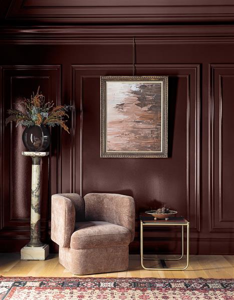 Accent seating with a marble plint and side table, adjacent to a high gloss wall painted in Townsend Harbor Brown HC-64, part of the Colour Trends 2027 collection.