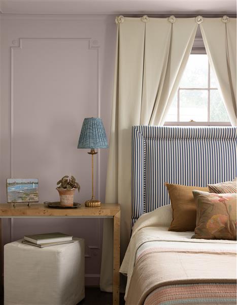 A colour drenched bedroom in Wild aster 1240, part of the Colour Trends 2027 collection.
